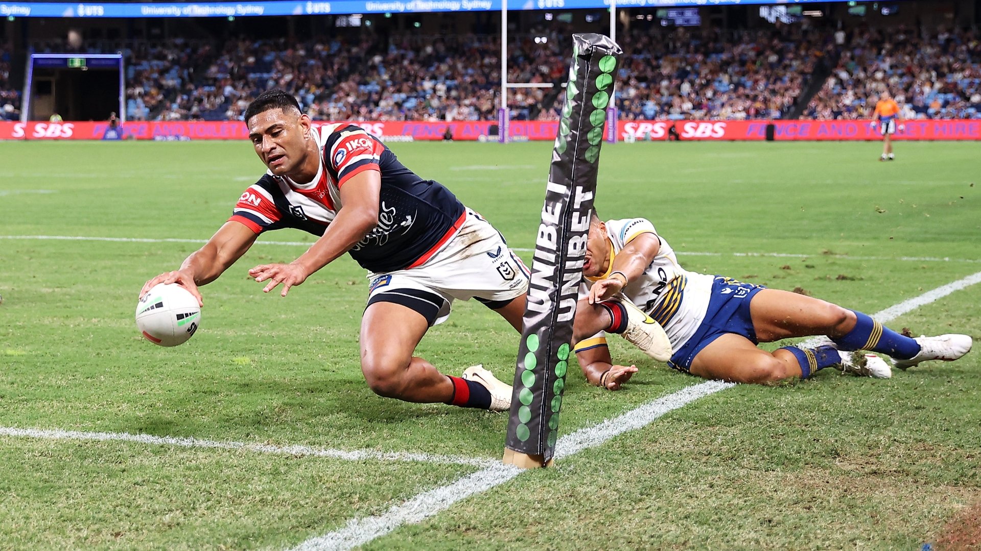 Roosters' finals hopes alive with NRL win over Dolphins